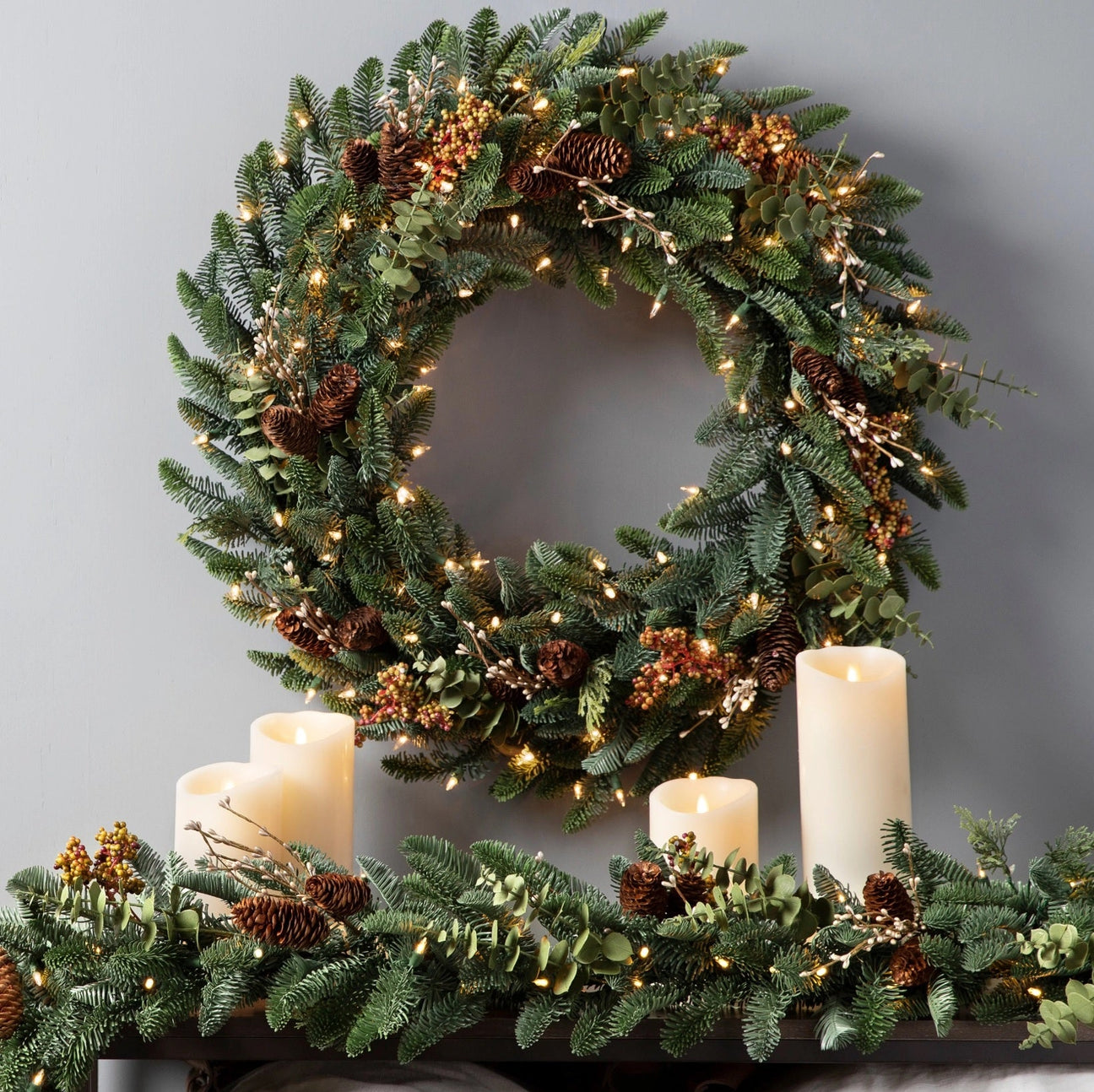 Christmas wreath with pine cones and berries