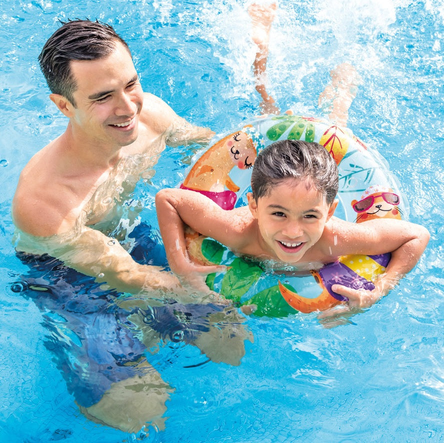 Inflatable inner tube with colorful otters on it.