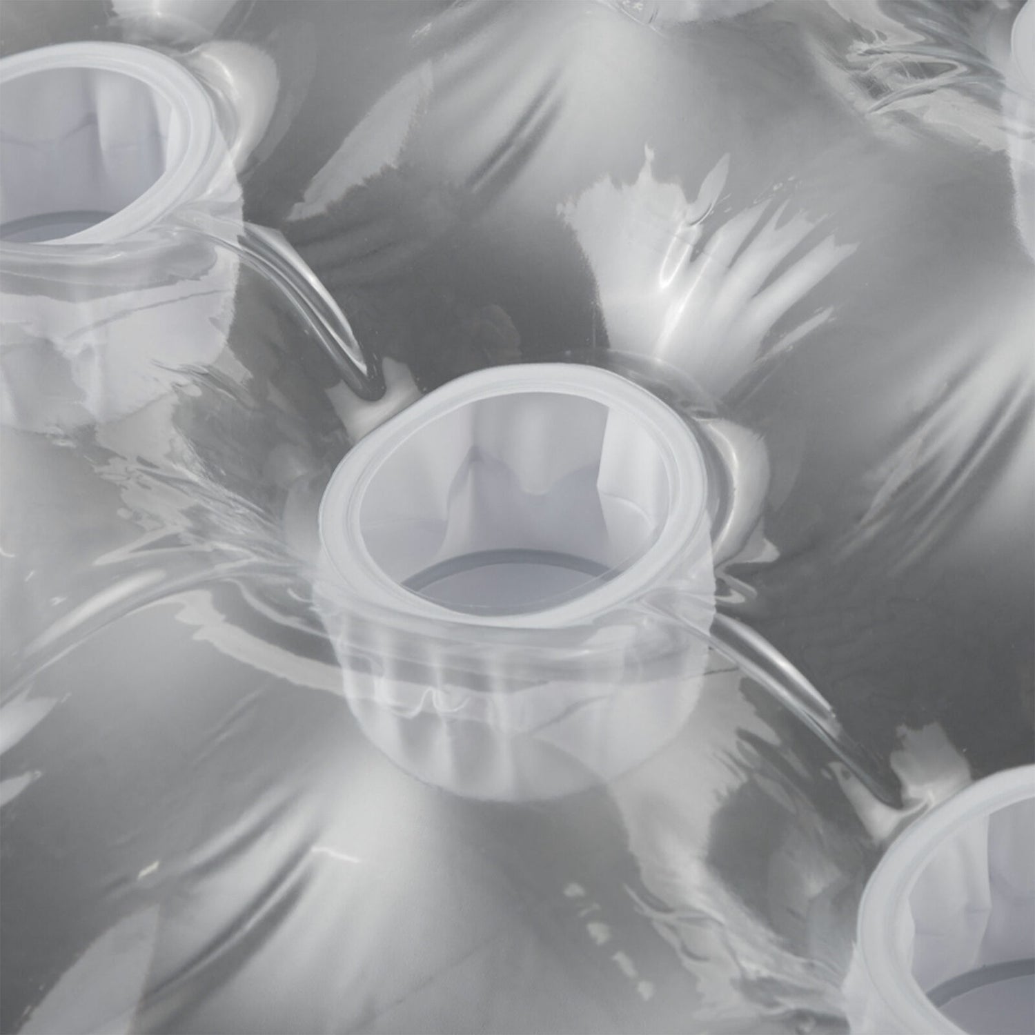 Silver inflatable pool mattress.