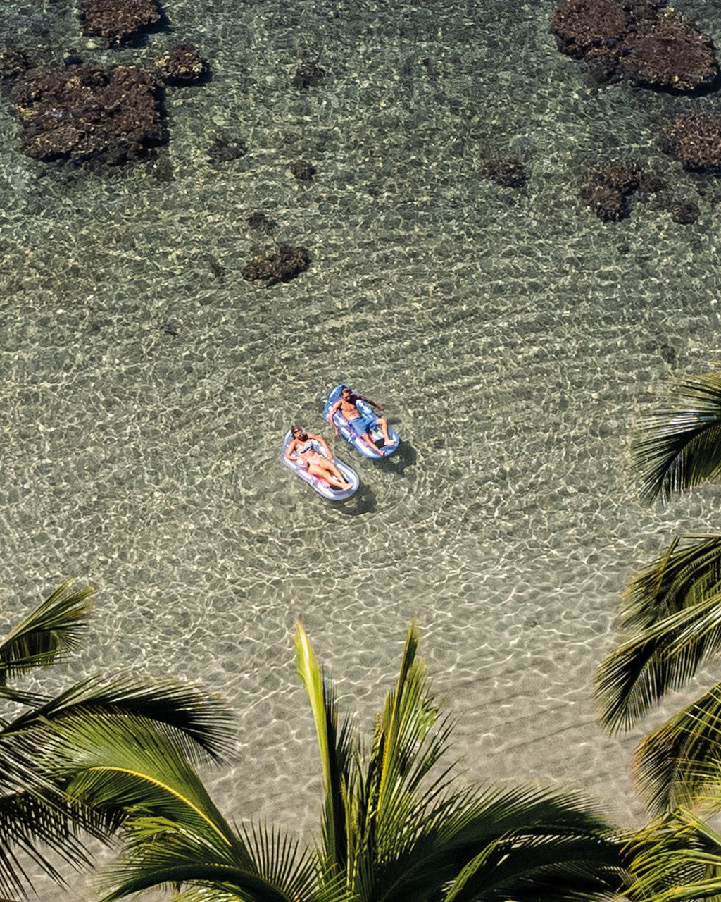 Two inflatable pool chairs.
