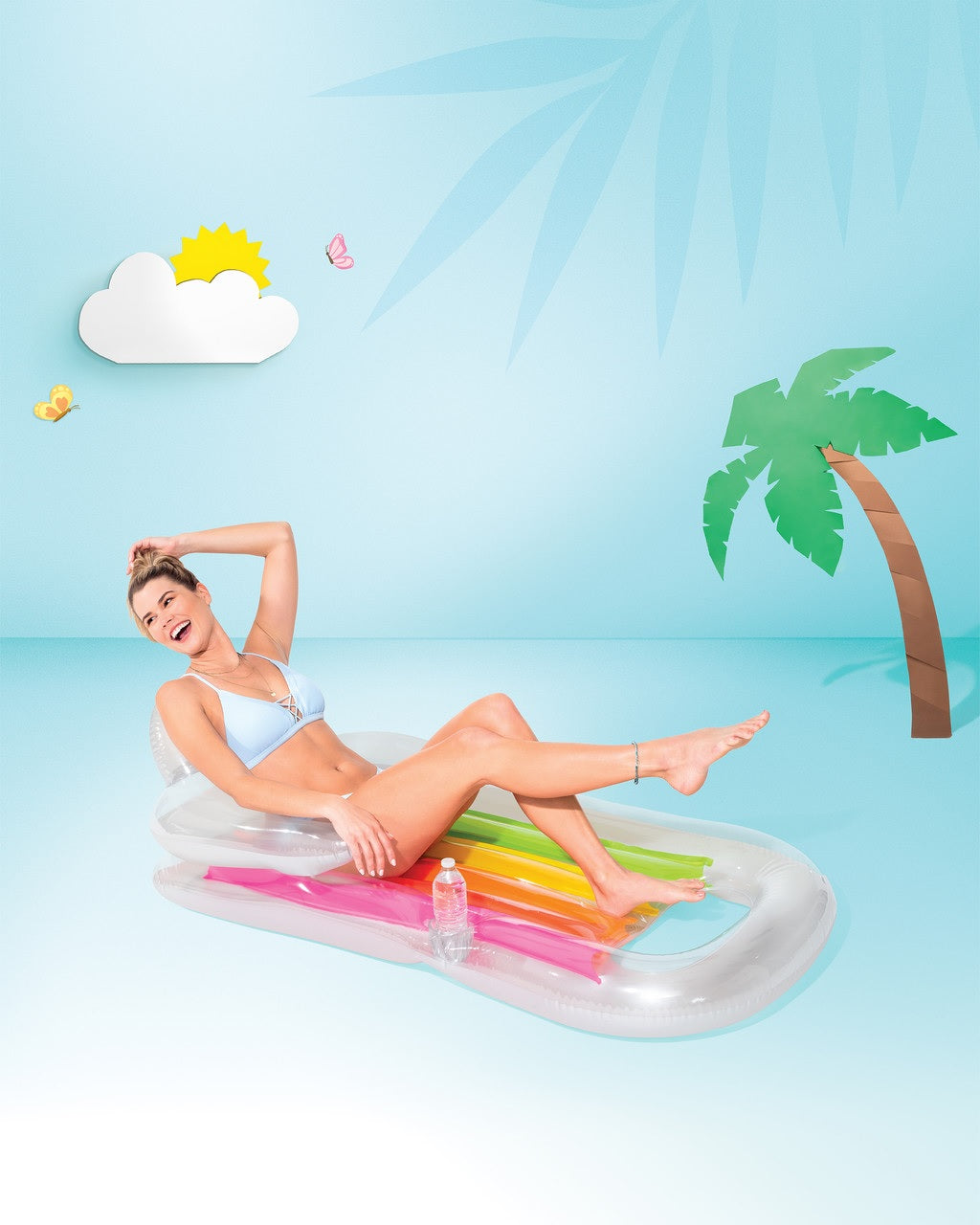 A clear inflatable pool chair with rainbow colored accents.
