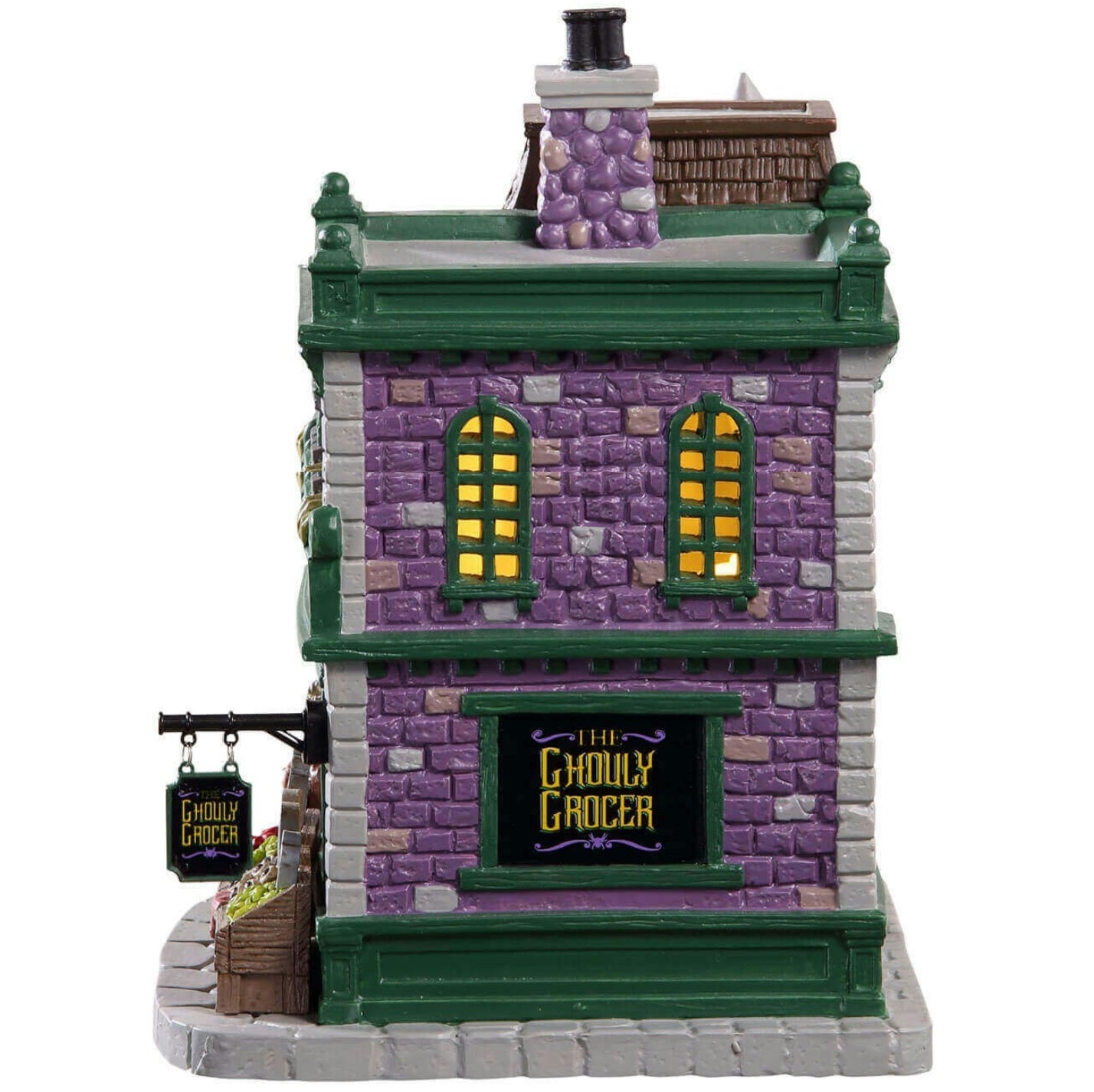 Porcelain lighted building for a Lemax display. Designed to look like a brick grocery store. There are monsters at the front door and boxes of stuff you can buy near the front window. Inside the window, you can see some creepy crawlies hanging from hooks. There are carved pumpkins on the roof.