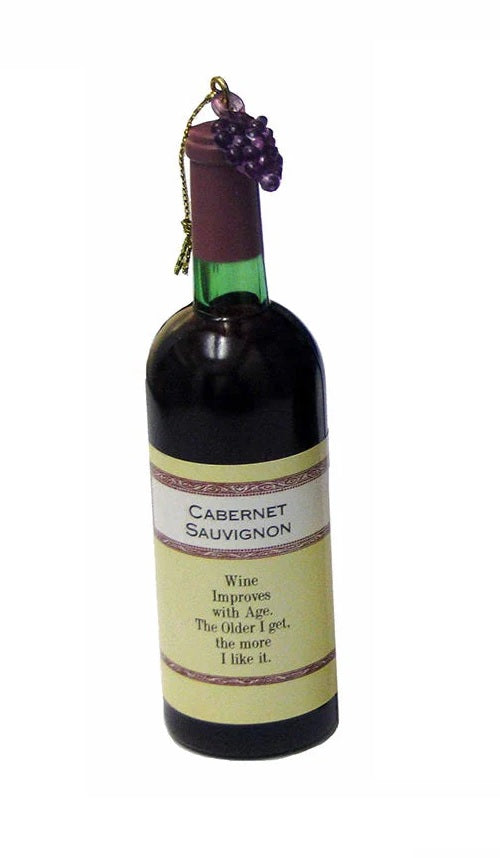 Intricately detailed miniature wine bottle ornament. One bottle reads "Cabernet Sauvignon. Wine improves with age. The older I get, the more I like it." One bottle reads "Pinot Noir. May this wine brighten the mind and strengthen the spirit." One bottle reads "California Chardonnay. Whine a bit every day and you'll feel better." One bottle reads "Merlot. May we always have old wines, good friends and fleeting care."