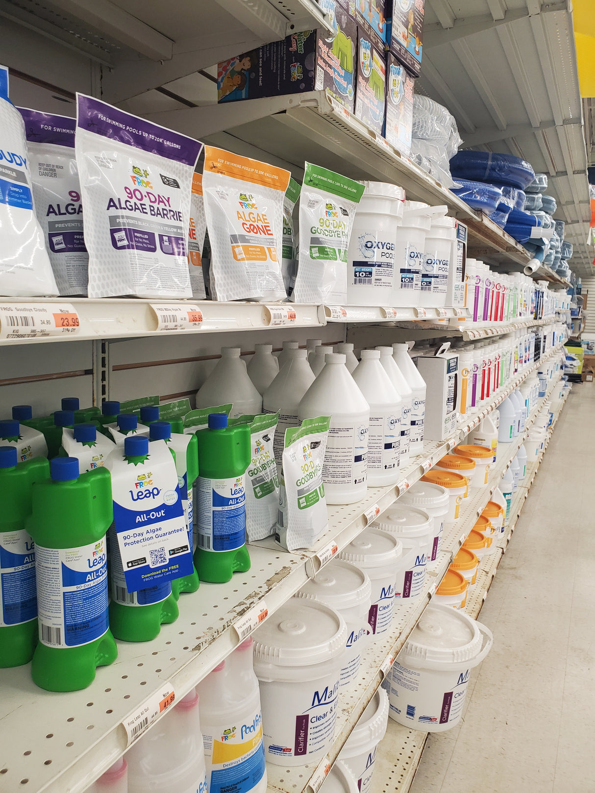 Various pool and spa chemicals on display at the Tinley Park Outlet store.