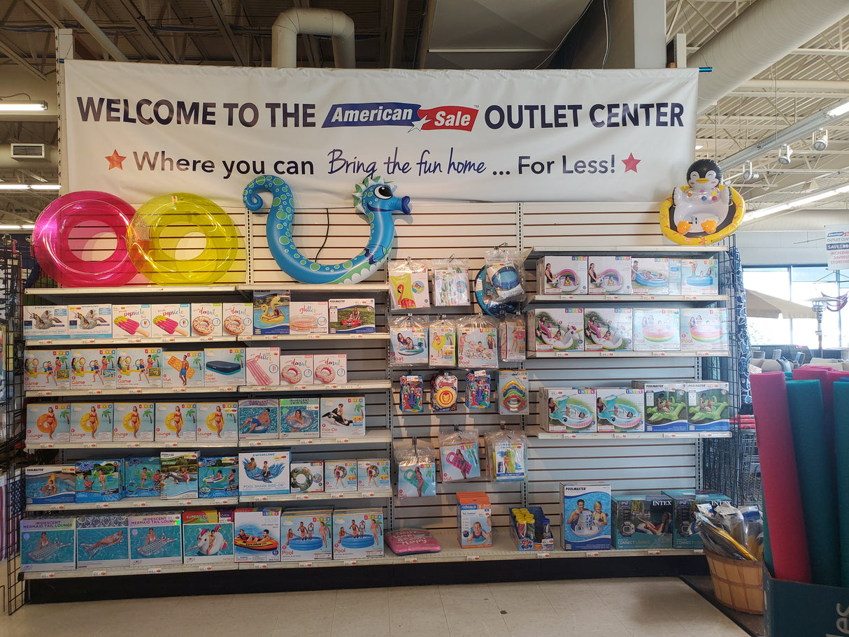 Store interior with a 'Welcome to the American Sale Outlet Center' sign and various products on shelves.
