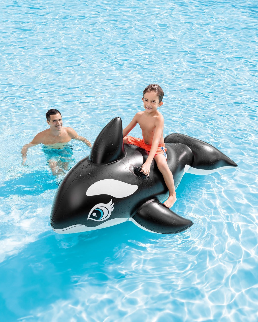 Pool inflatable shaped like a whale.