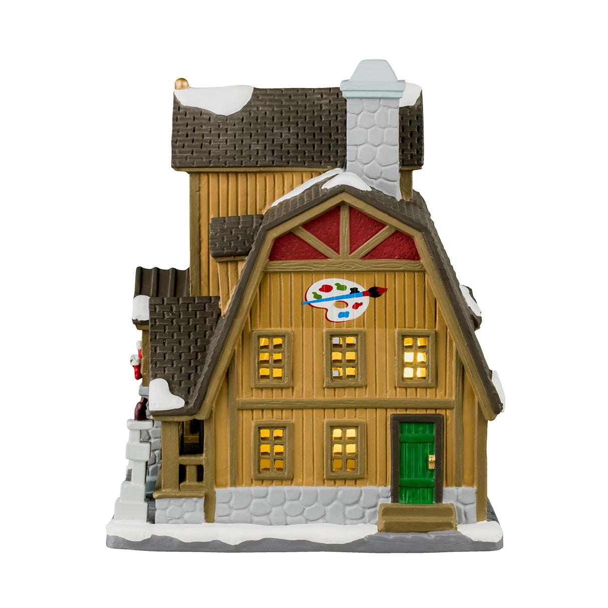 Porcelain lighted building for a Lemax display. Designed to look like a charming house covered in snow. There's a decorated wreath near the roof and on the front door. There's a decorated tree outside and stockings hanging on the sides of the entrance. You can see someone painting inside. The sign on the building reads "Aspen Artist's Lofts" and the sign outside the porch reads "Holiday Art Sale!" There's a cute bunny in the snow and a squirrel on a column near the porch.