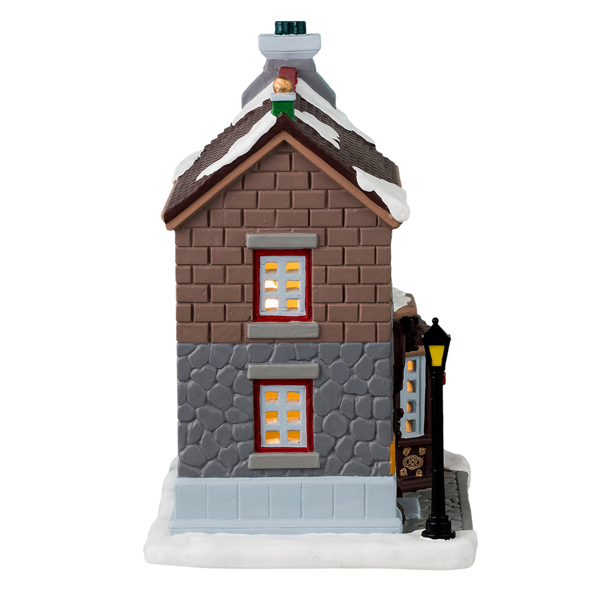 Porcelain lighted building for a Lemax display. Designed to look like a brick and stone building. There's snow on the roof and on the sidewalk. The sign above the door reads "Clearview Post Office."