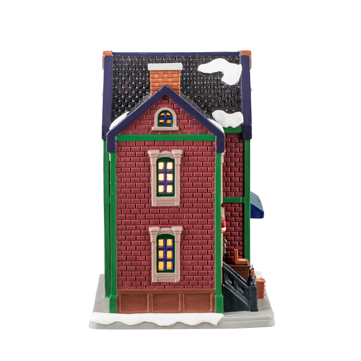 Porcelain lighted building for a Lemax display. Designed to look like a brick building with snow on the roof and the sidewalk. The signs read "The Tobacco & Gift Emporium" and "Special Today: Cheroots 2 for 1." There's a decorated wreath on the door. Through the window in the front, you can see a man buying cigars from a man behind a counter.