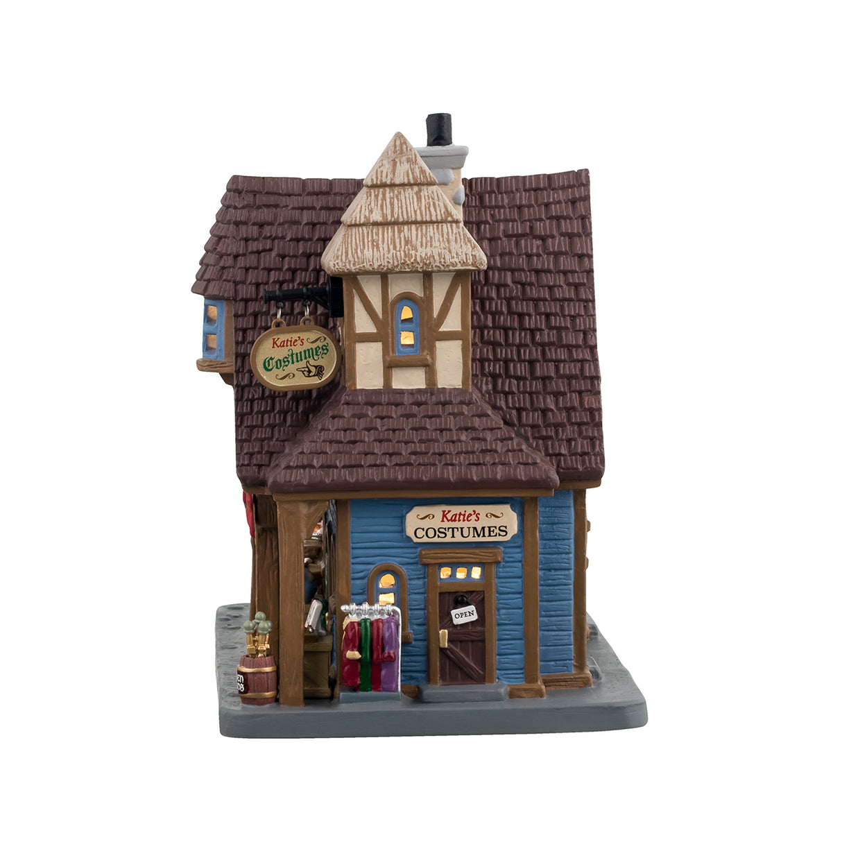 Porcelain lighted building for a Lemax display. Designed to look like a renaissance cottage with different shops. Get a turkey leg at Tom's. Buy a helmet that's on sale at the armory. Get hand-crafted jewelry and wooden swords. Tom's Turkey Legs is a light green color. The other shops are a light blue color.