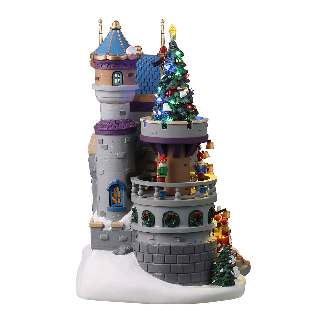 Resin lighted building for a Lemax display. Designed to look like a stone castle decorated for a Christmas gala with Santa. There are people dancing on the balcony and decorative nutcrackers. There are decorated Christmas trees, a snowman and red/white striped candle lights outside.