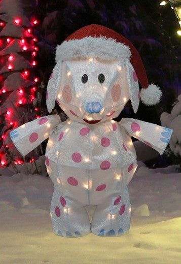 This is a lifestyle image showing the elephant decoration on a snowy lawn.