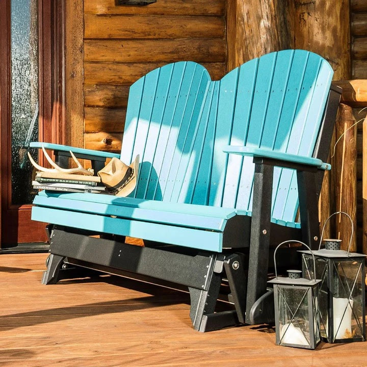 This is a lifestyle image of an Aruba Blue and Black colored Adirondack glider bench on a wooden porch.
