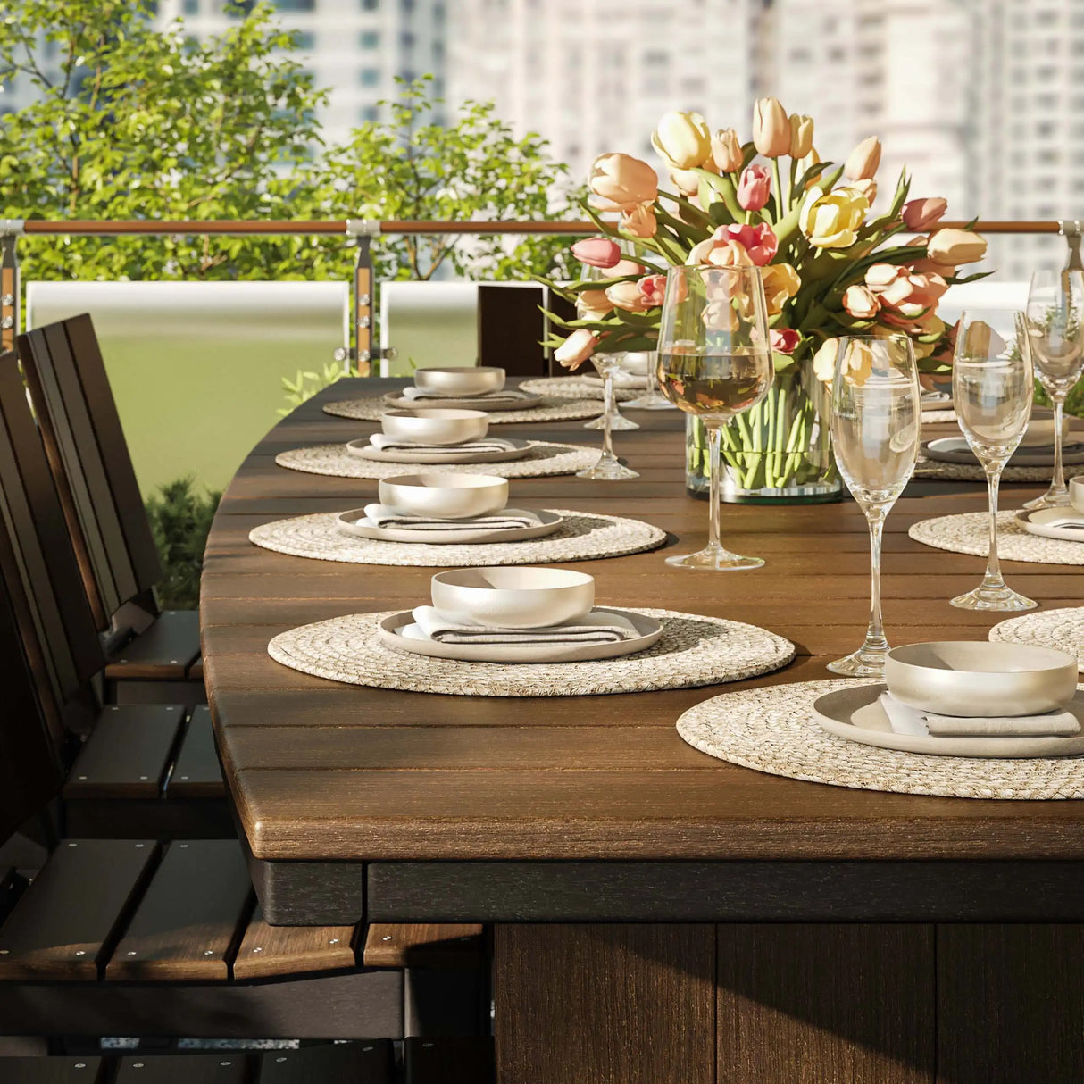 This is a up close view of the Antique Mahogany and Black colored dining table with matching chairs. There are plates and wine glasses on the table.