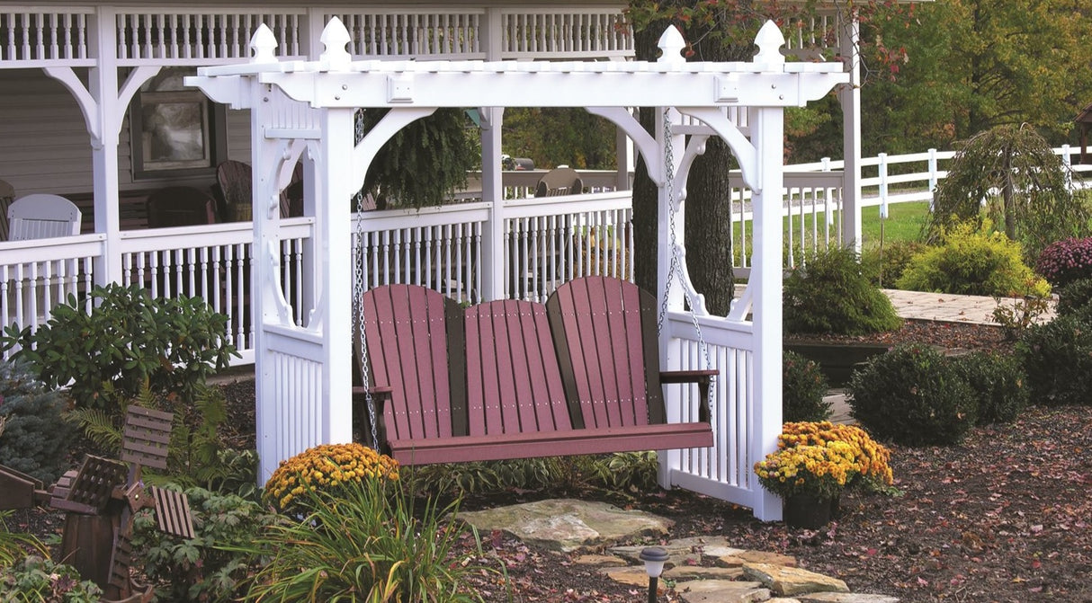 This is a lifestyle image showing the Cherrywood and Black colored Adirondack swing hanging from a white gazebo.