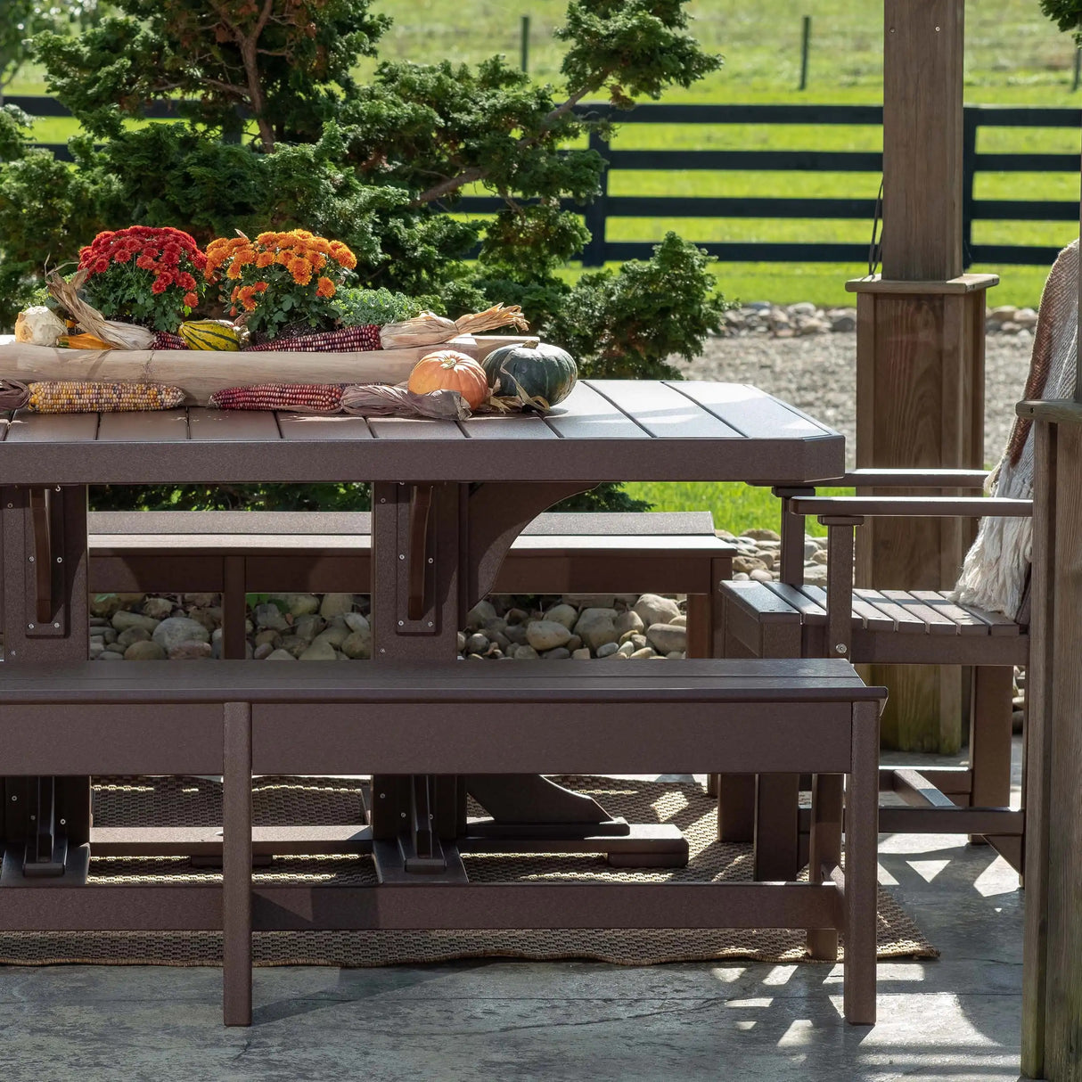 This is the Chestnut Brown colored dining table with matching chairs and a bench.