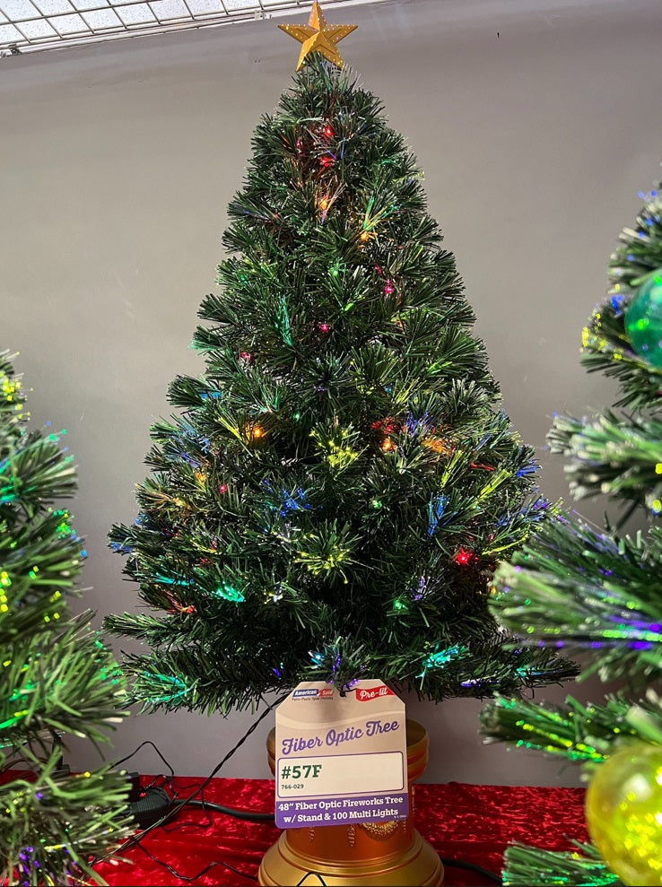 4 ft. fiber optic tree with a gold base and a star on top.