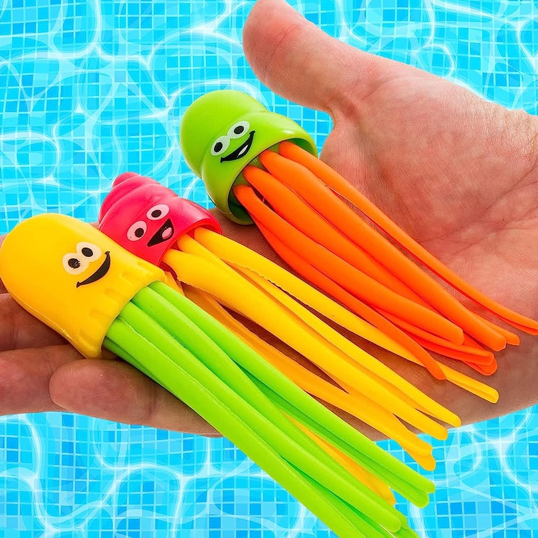 Pool dive toy shaped like an octopus. They're multi-colored and have cute, smiling faces.