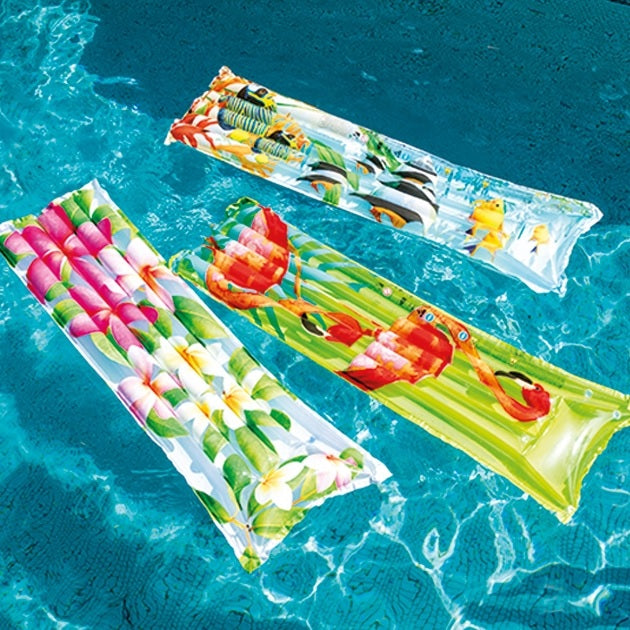 Colorful pool mattresses with different designs.