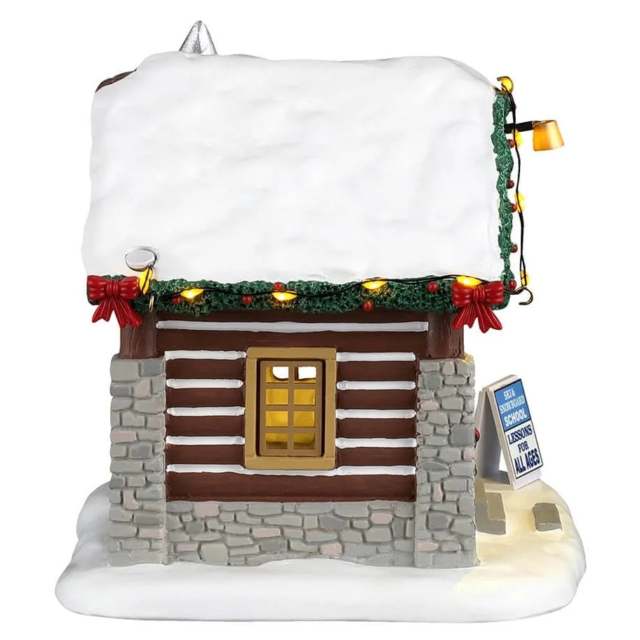 This image shows what the other side of this building looks like. The roof is covered in snow.