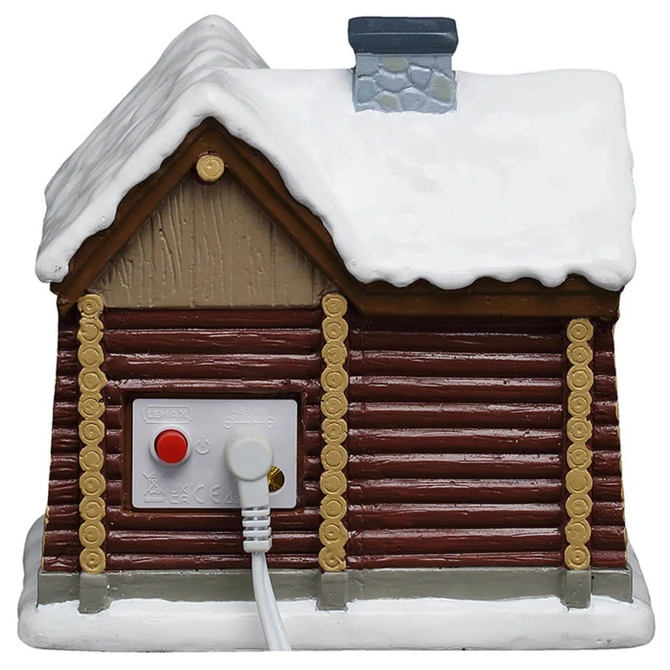 This is the back of the log cabin table piece. You can see the On/Off button, as well as the power source.