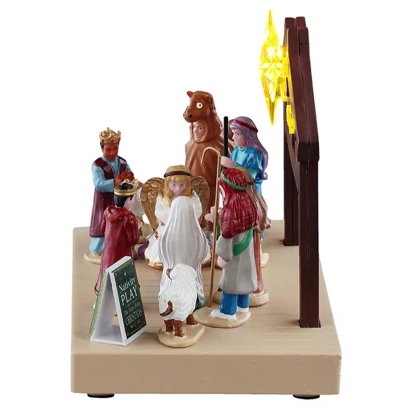 This image shows what this table accent looks like from the side. You can see someone dressed up like a donkey, someone dressed up like an angel, someone dressed like one of the Three Kings and someone dressed up like a shepherd.