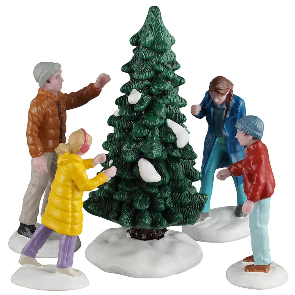 This image shows what these five Lemax Caddington Village figurines look like on a white background. This was designed to create a scene that looks like a family picking out a tree to chop down for Christmas. The dad is wearing a brown jacket. The mom is wearing a blue jacket. The daughter is wearing a yellow jacket. The son is wearing an orange jacket.
