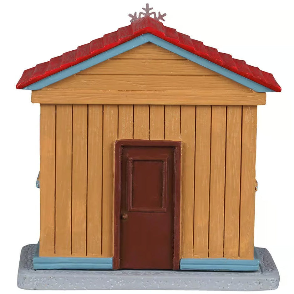 This image shows what the back of this table accent looks like. There's a brown door.