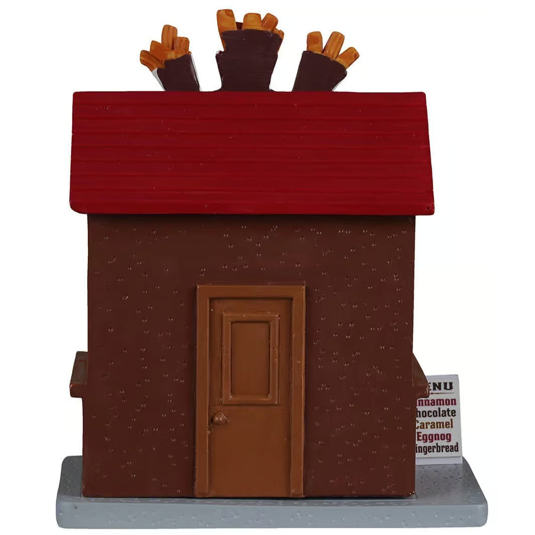 This image shows what the back of this table accent looks like. There's a brown door.