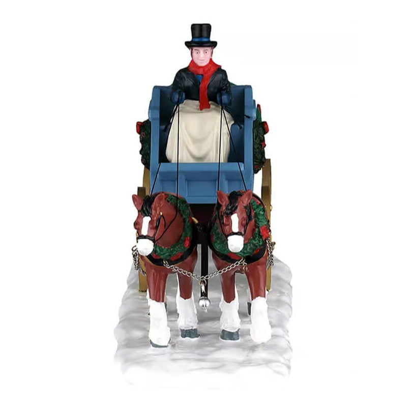 This image shows what this table accent looks like from the front. The two horses are wearing wreaths around their necks.