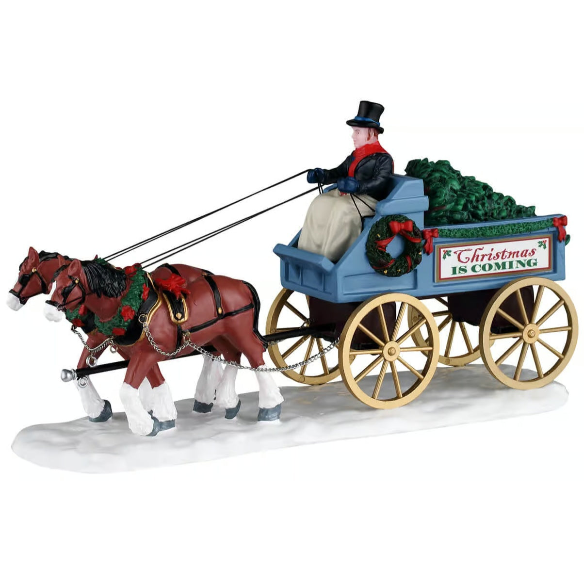 This image shows what this Lemax Caddington Village table accent looks like on a white background. It was designed to look like two horses pulling a large carriage through the snow. Inside the carriage, there are Christmas trees. There's a man steering the horses. He's wearing a black top hat, a black jacket and a tan colored blanket.