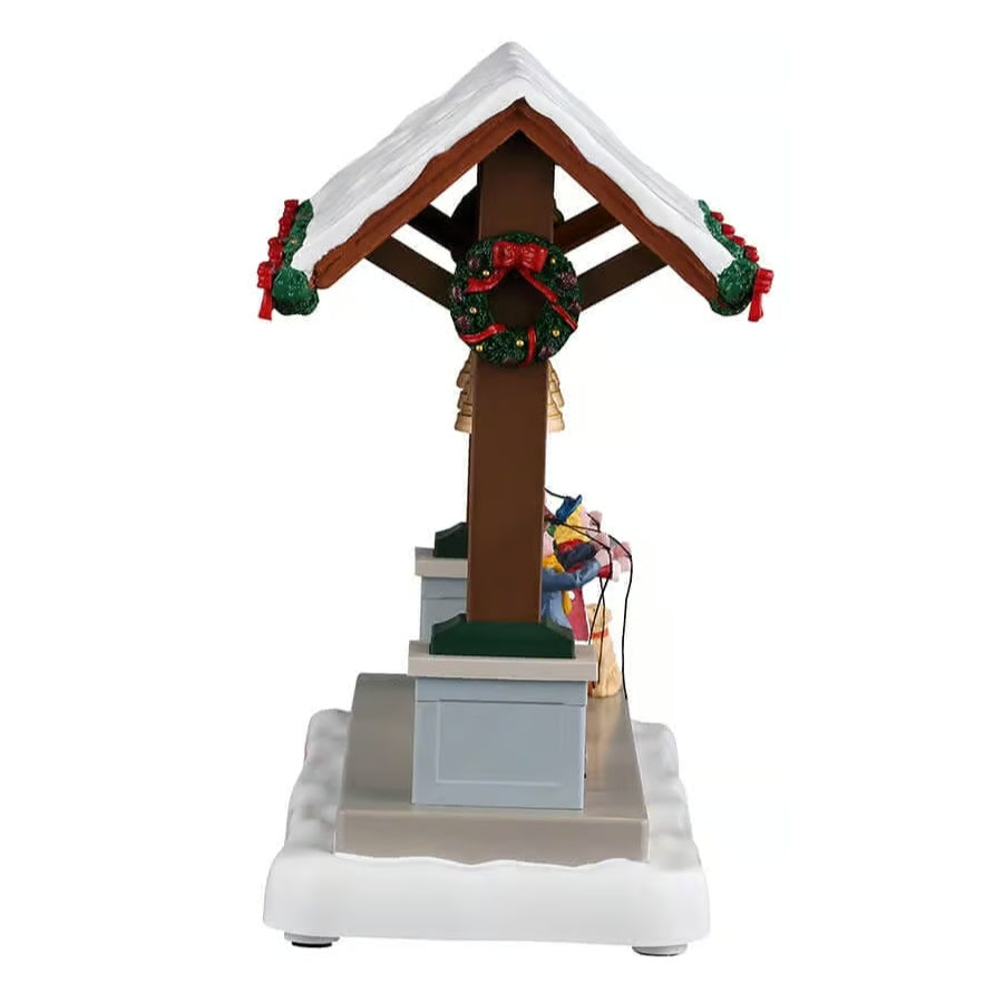 This image shows what this piece looks like from the other side. The top near the roof is decorated with a wreath.