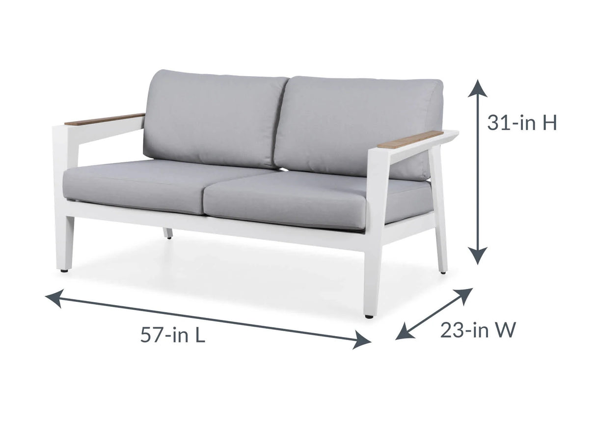 This image shows the loveseat and its dimensions. From top to bottom it measures 31 inches tall. From left to right it measures 57 inches long. From front leg to back leg it measures 23 inches.