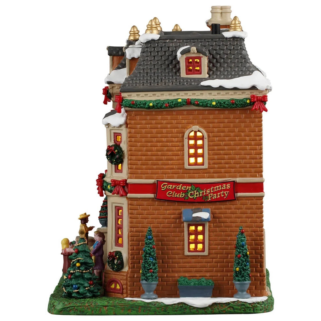 This image shows what the other side of this building looks like on a white background. There are two potted trees decorated with ornaments and a large red sign that reads "Garden Club Christmas Party."
