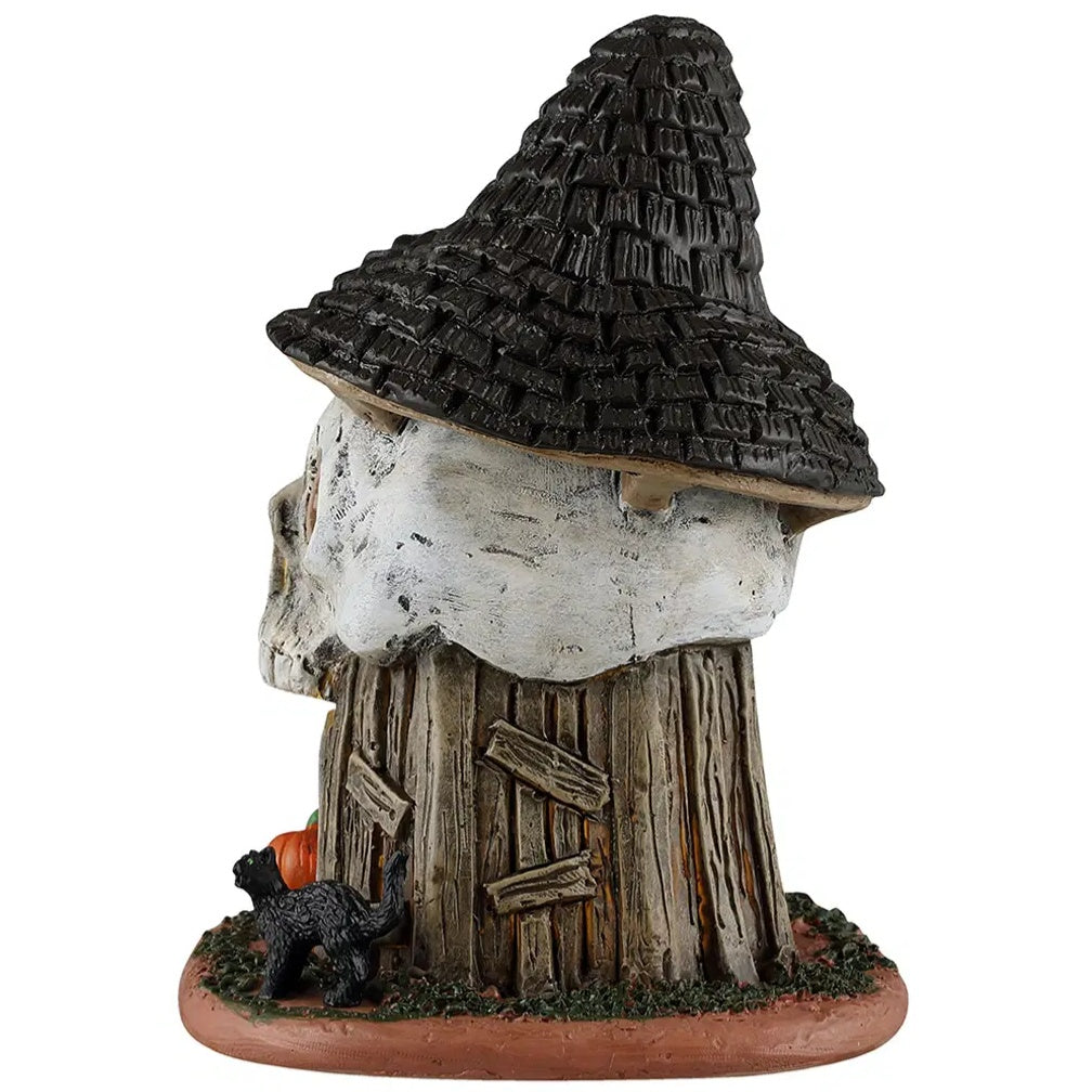 This image shows what the other side of the piece looks like. There's a black cat peering around the corner.