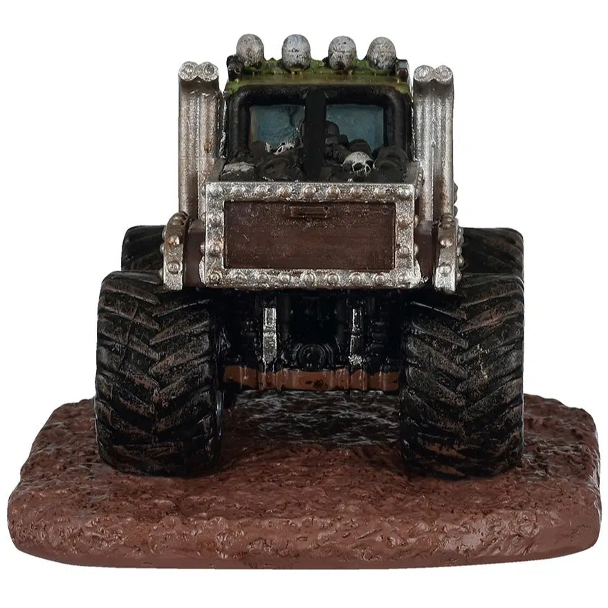 This image shows what this monster truck looks like from behind. The truck bed is filled with dirt and skeletons.