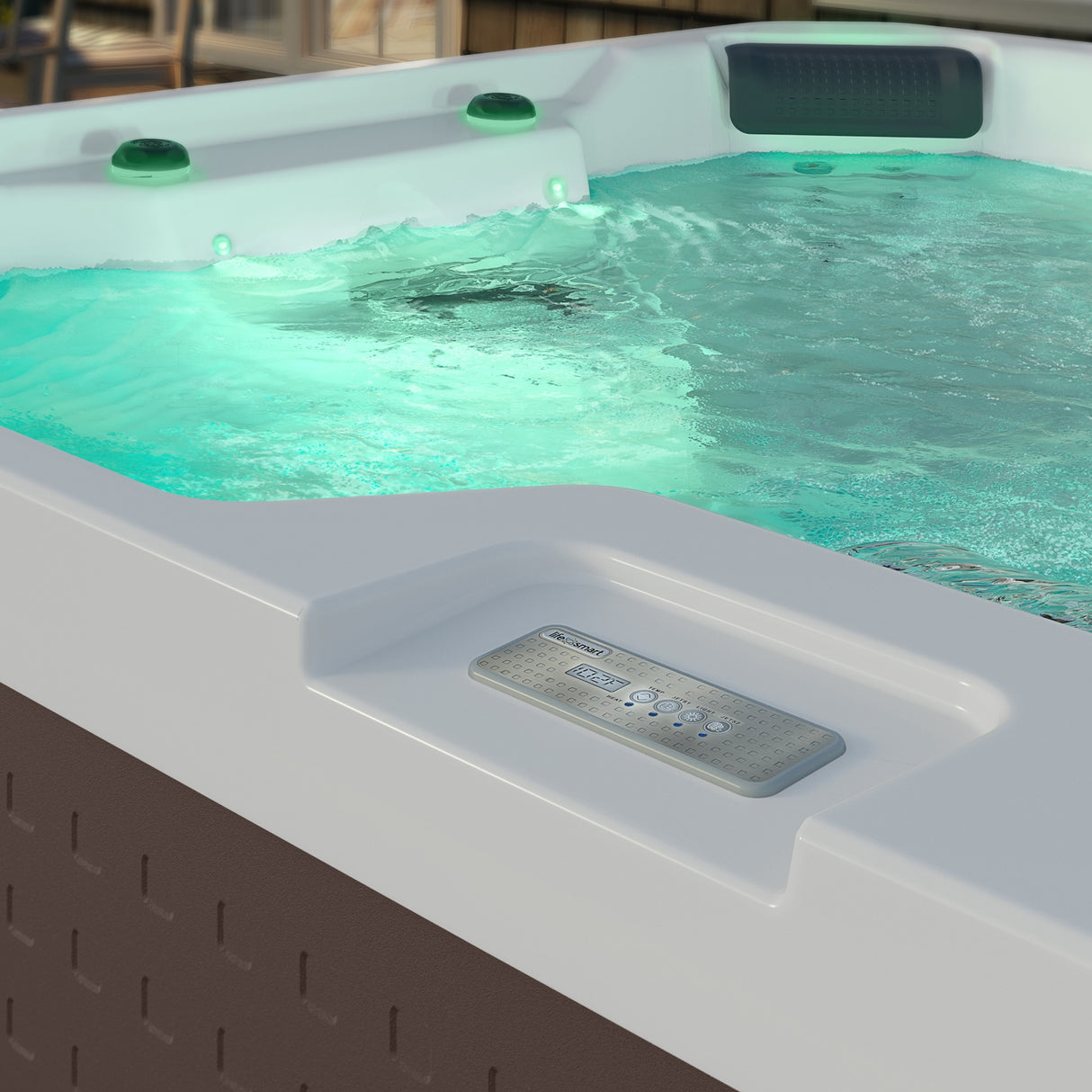 This is an up close view of the control panel on the side of this filled hot tub.