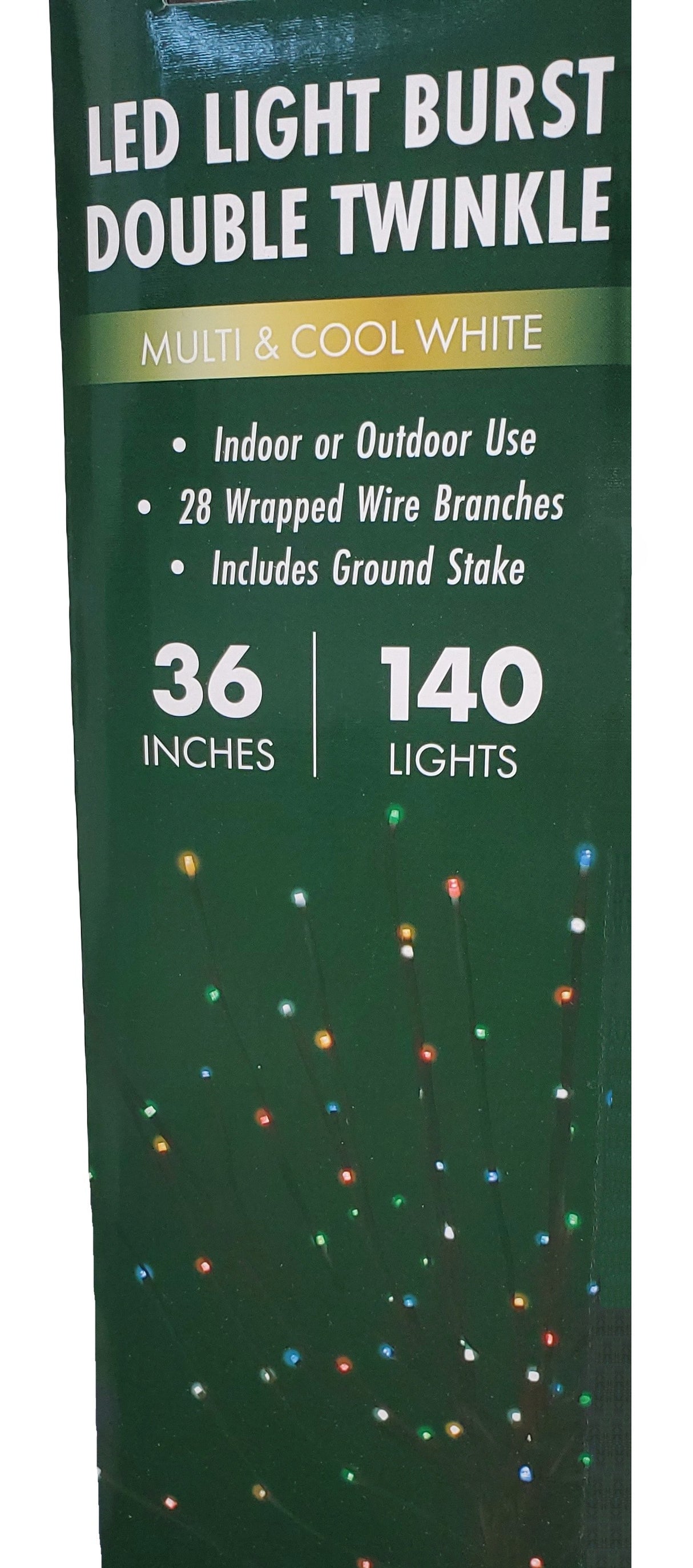 This image shows the packaging that this LED light burst double twinkle decoration comes in. It reads "Multi & Cool White. Indoor or Outdoor use. 28 wrapped wire branches. Includes ground stake. 36 inches. 140 lights."