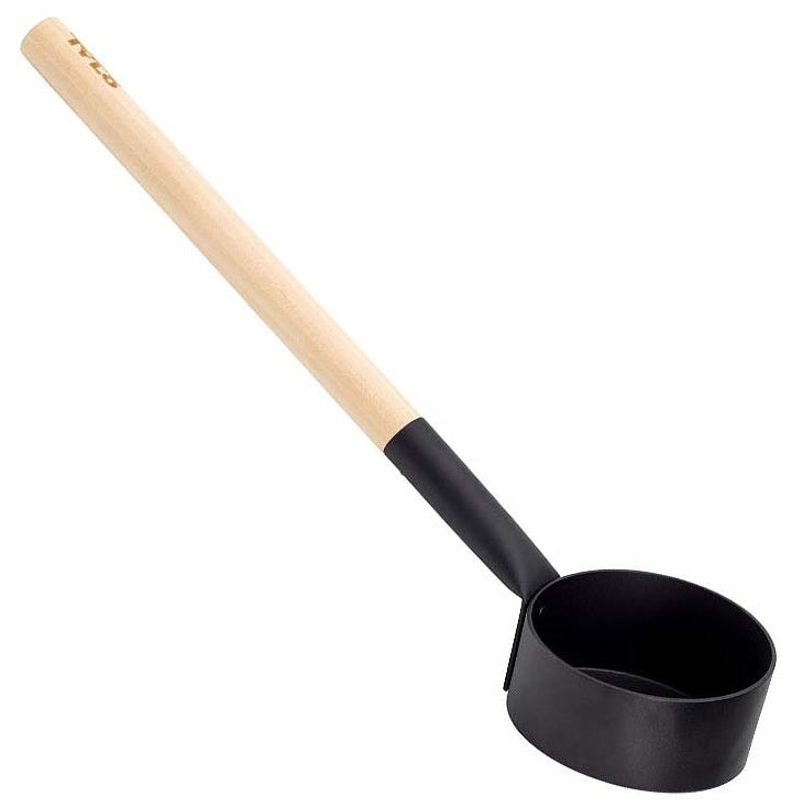A sauna ladle from Tylo. The scoop part is made of black aluminum and the handle is made of birch and aspen wood.