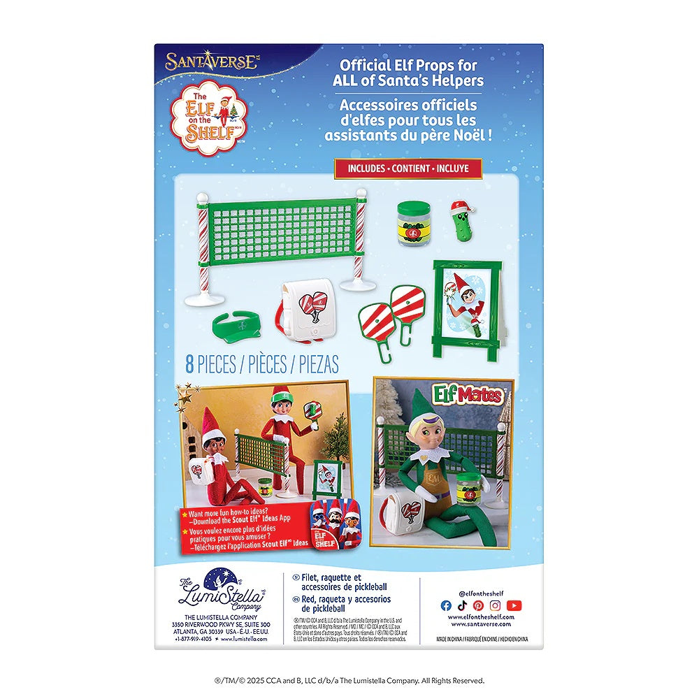 This is the back of the packaging that this pickleball kit comes in. It reads "Santaverse. The Elf on the Shelf. Official elf props for ALL of Santa's Helpers. Includes 8 pieces. Want more fun how-to ideas? Download the Scout Elf Ideas App."