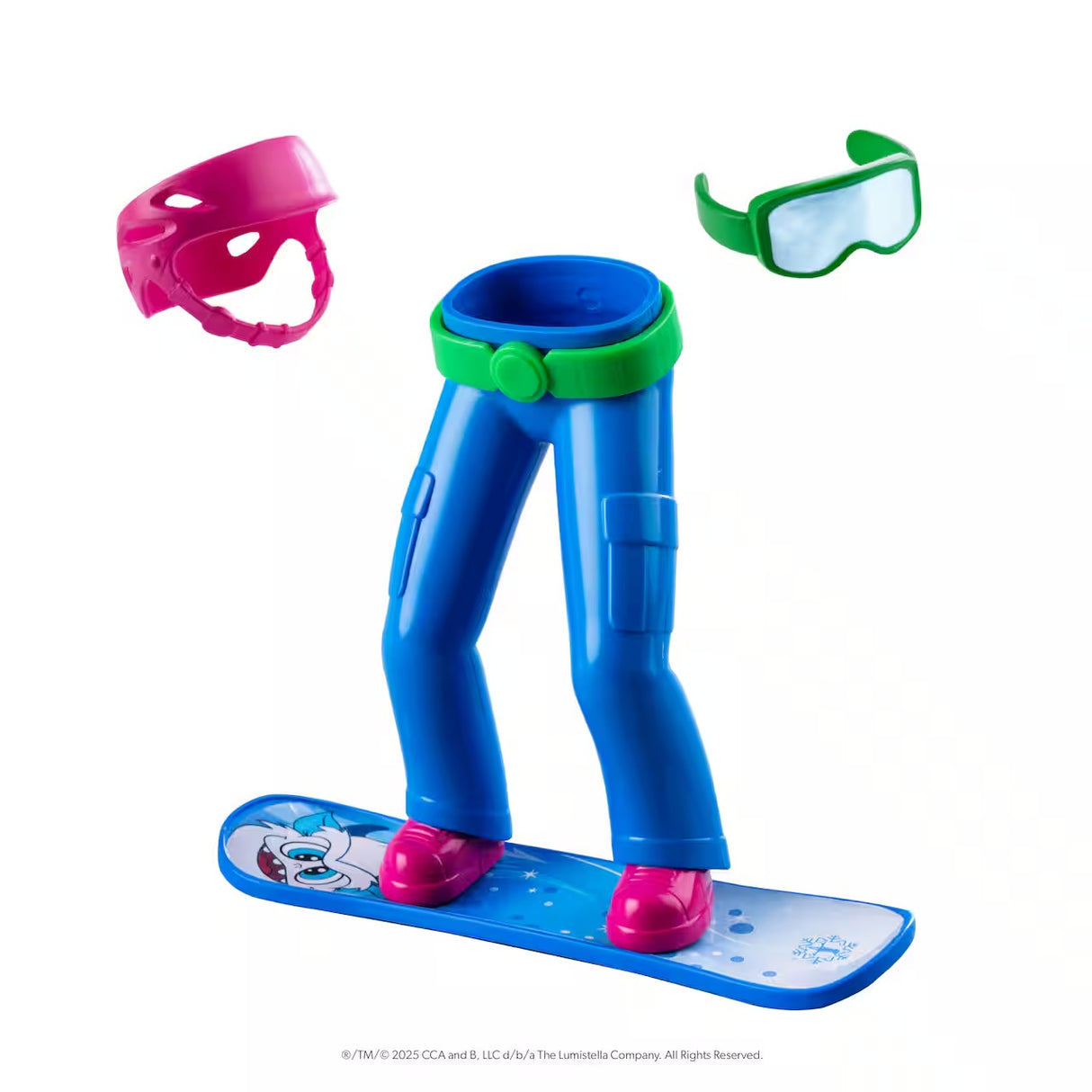This image shows what comes in this Elf on the Shelf snowboard kit. It includes: an pink elf-sized helmet, green elf-sized googles, blue "magic" pants with a green belt and pink boots attached to a blue snowboard. The "magic" pants make it possible for your Scout Elf to stand upright without any help.