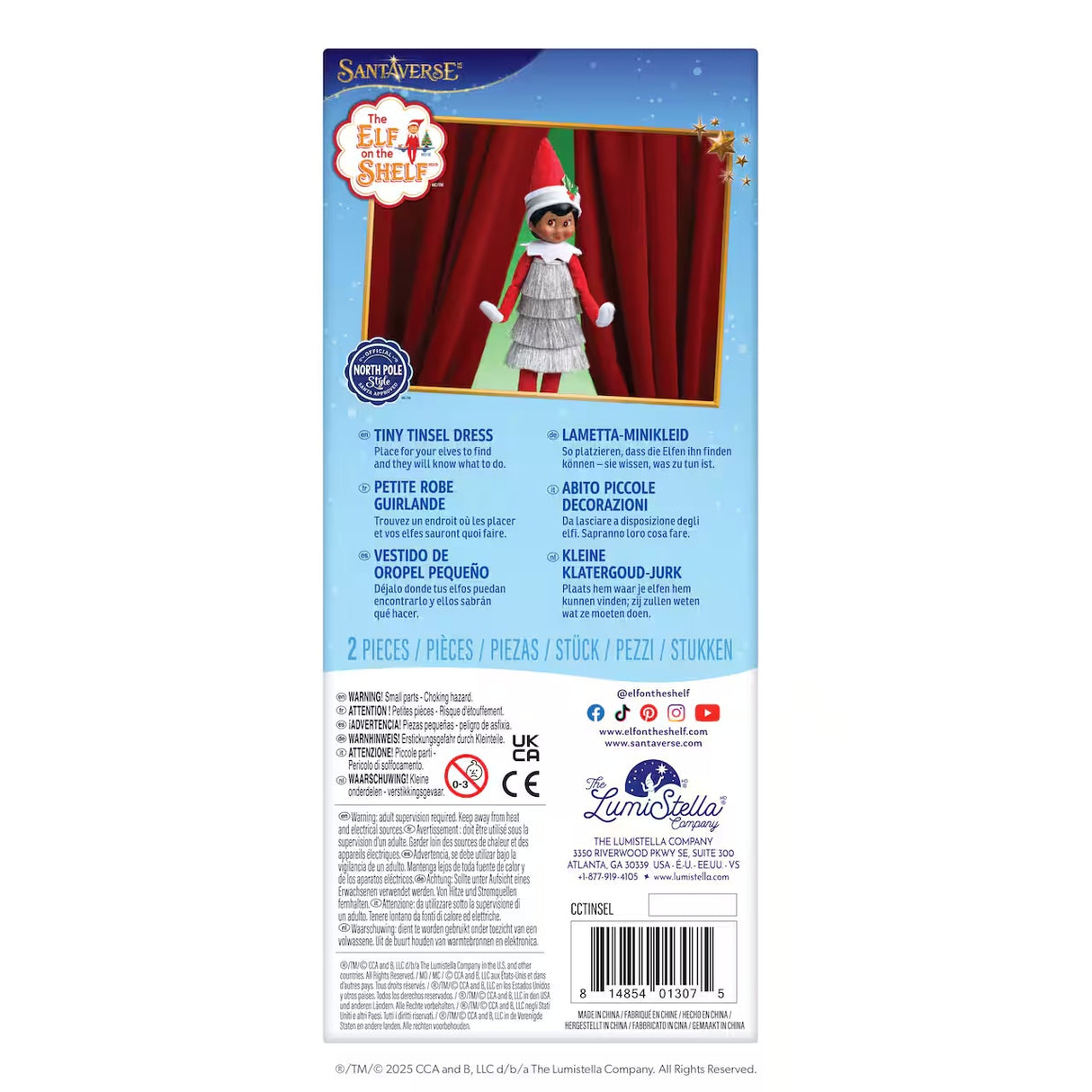 This is the back of the packaging that this elf dress comes in. It reads "Santaverse. The Elf on the Shelf. Official North Pole Style Santa Approved. Tiny tinsel dress. Place for your elves to find and they will know what to do."