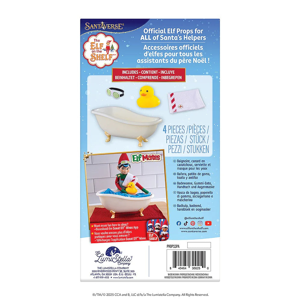 This image shows the back of the packaging. It reads "Santaverse. The Elf on the Shelf. Official elf props for ALL of Santa's Helpers. Want more fun how-to ideas? Download the Scout Elf Ideas App."