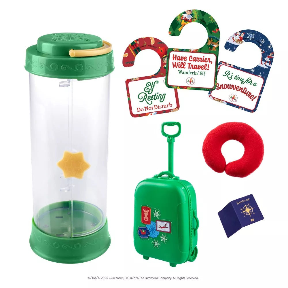 This image shows everything that comes in this 20th Limited Edition Elf on the Shelf kit. It includes: the Scout Elf carrier, three double-sided door signs, a ribbon, an elf-sized suitcase, an elf-sized neck pillow and an elf-sized passport.