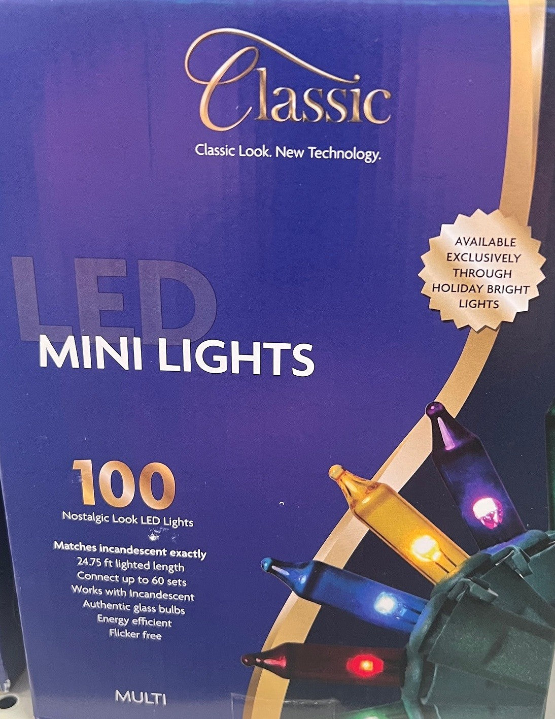 This image shows the box that the multi-colored lights come in. It reads "Classic look, new technology. LED Mini Lights. Available exclusively through Holiday Bright Lights. 100 nostalgic-look LED lights. Matches incandescent exactly. 24.75 ft. lighted length. Connect up to 60 sets. Works with incandescent authentic glass bulbs. Energy-efficient. Flicker free."