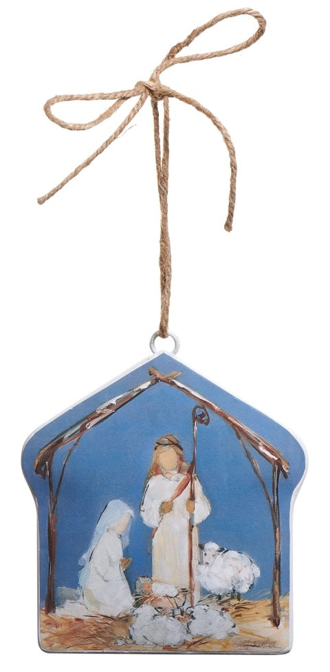 This image shows a blue ornament featuring Joseph and Mary standing over baby Jesus in a manger.