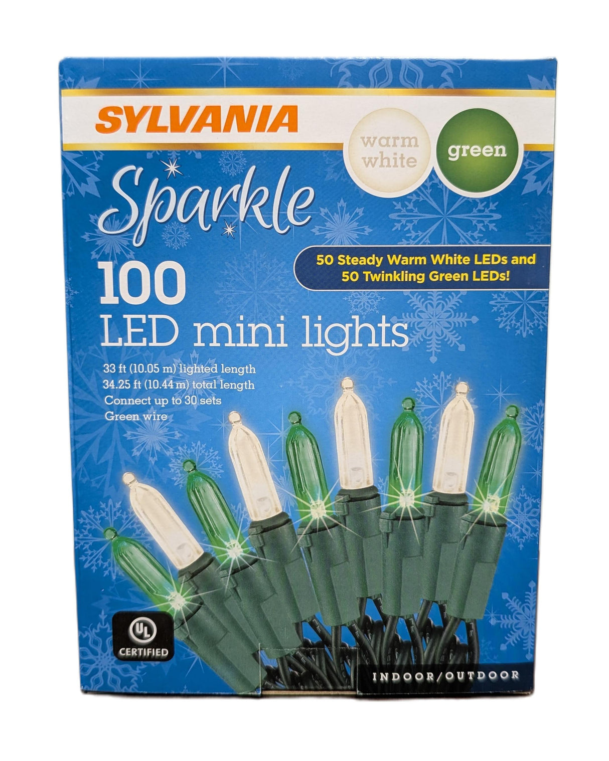 Sylvania Warm White and Green LED mini lights packaging with green and white lights on a blue background