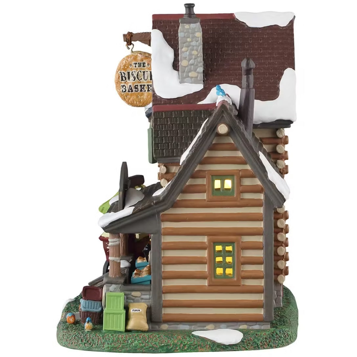 This is the other side of the building. You can see light coming in through the two windows. There are crates and a bag of flour near the stone porch.