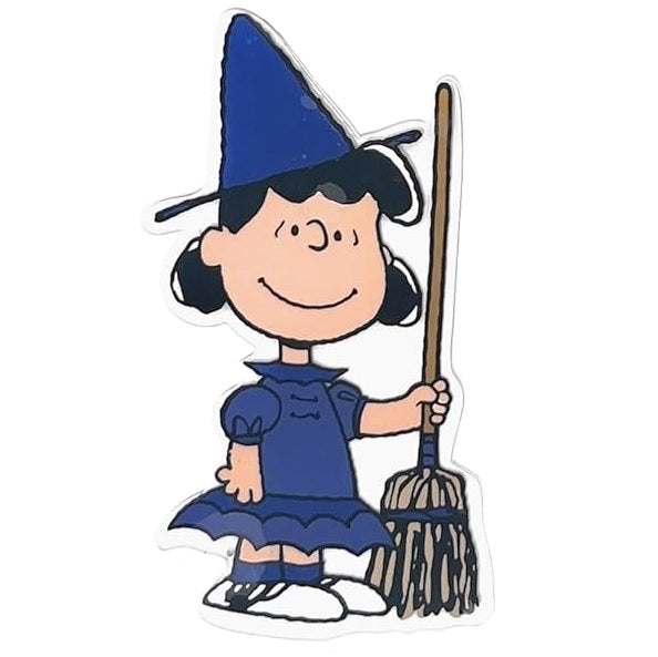 This image shows one of the gel clings. It's designed to look like Lucy dressed as a witch. She's wearing a blue pointy hat, a blue dress, blue socks and black and white shoes. She's holding a broom.