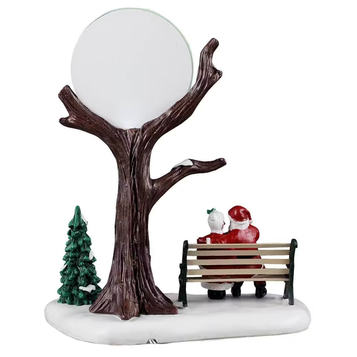 This is the back of the accent. You can see the tree, and the tree and the back of Santa and Mrs. Claus's heads.
